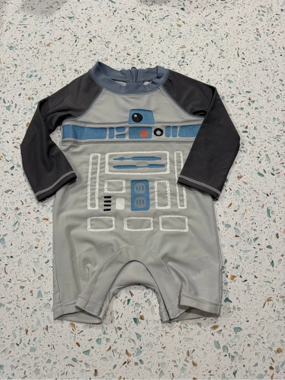 Like-new GAP x Star Wars one-piece rash guard swimsuit in size 6–12 months